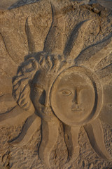Sun in stone sculpture