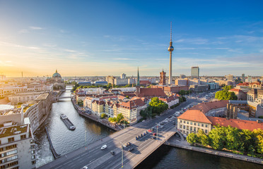 Berlin skyline panorama with TV tower and Spree river at sunset, Germany