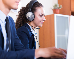 two happy help line operators