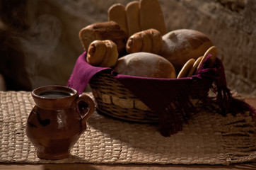 Cup of coffee and bread.