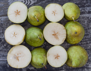 Green pears on the old board