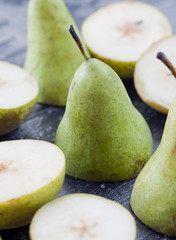 Green pears on the old board