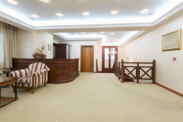 Fototapeta premium Hotel lobby with reception desk