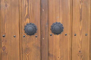 New wooden door with decoratice black doorknob