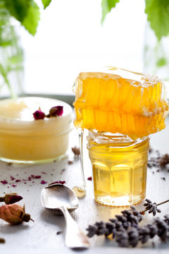 Honey variaty with bee's comb in a glass jurs