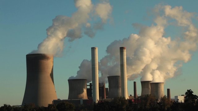 Coal fired power plant station; cooling towers, boilers and chimneys; industrial air pollution; 