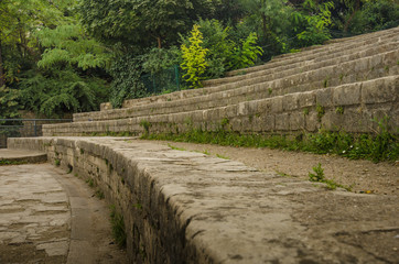 The stone bleachers at Arenes de Lutece are among the remains of one of the largest amphitheaters built by the Romans. - 93276493