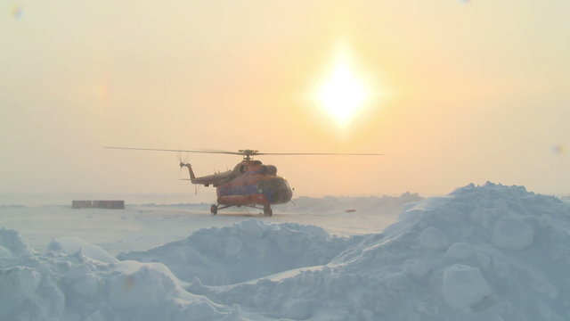 Helicopter MI-8 take to the skies in the far north.