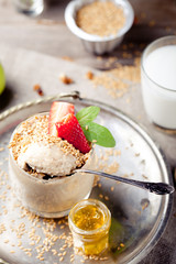 Flax seeds, oat pudding in a glass with berries