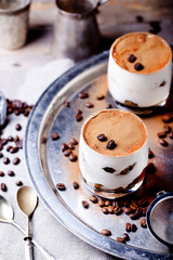 Coffee and rum flavor tiramisu in glass cups