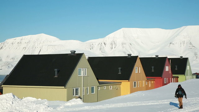 A small town in the far north of Europe among the snow-capped mountains. Longyearbyen, Svalbard.