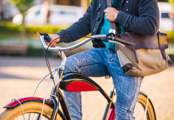 Obraz premium Man with bicycle