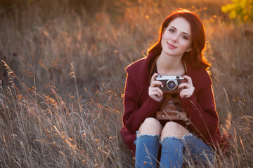 Woman with vintage camera