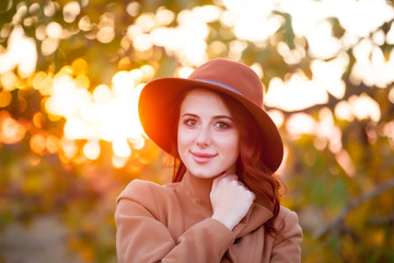 Woman in hat and coat