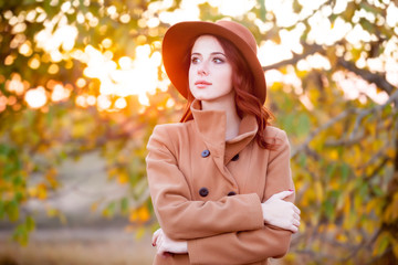 Woman in hat and coat