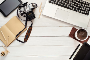 Designer using graphic tablet in work, photo editing from above