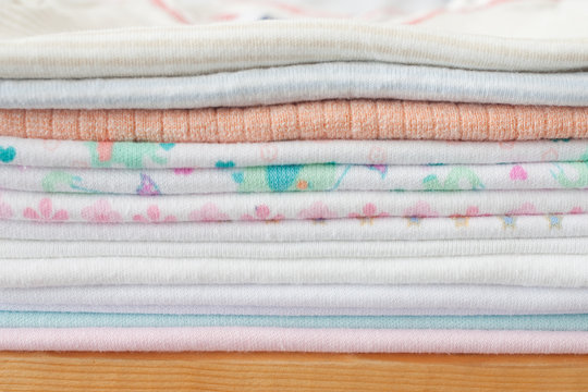 Stack Of Baby Clothes - Studio Shot