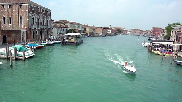 Boat sailing in the canal in the island of Murano