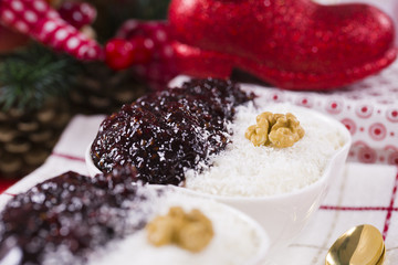 Rice Pudding and Strawberry Jam with Nuts, New Year Decoration in Red Color