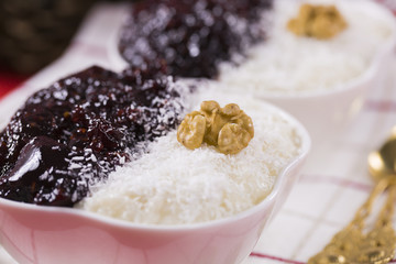 Rice Pudding and Strawberry Jam with Nuts, New Year Decoration in Red Color