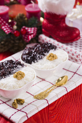 Rice Pudding and Strawberry Jam with Nuts, New Year Decoration in Red Color