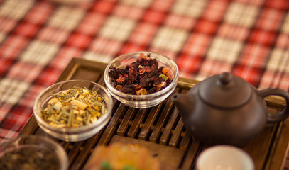 Set of dishes for chinese tea ceremony on tray. Red tea