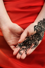 Image of henna on female hand, closeup