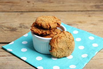 Homemade cookies in small bowl on table close up