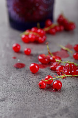 Fresh red currants on table close up