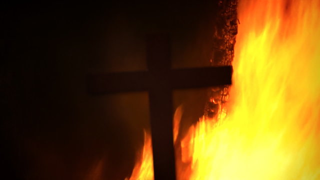 Cross silhouette fire pyre pole detail