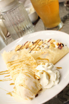 Crepes with banana and ice cream