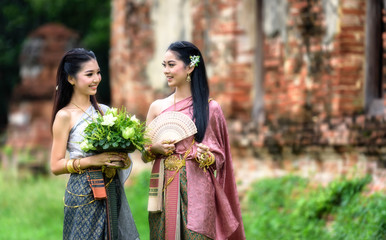 Beautiful Thai girl in Thai traditional costume