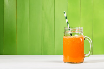 Carrot juice in masons jar