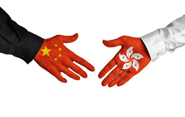 China and Hong Kong leaders shaking hands on a deal agreement