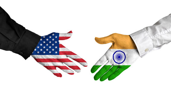 United States and India leaders shaking hands on a deal agreement
