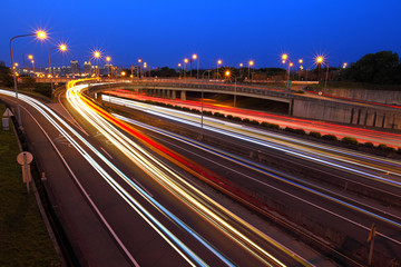 Fototapeta na wymiar Car light trails on highway at night