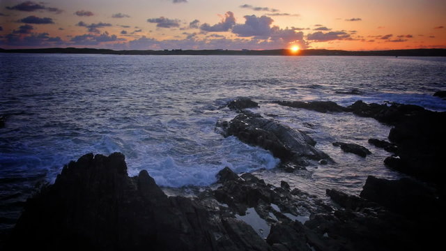 Soothing waves with the last light of the sun over the Atlantic Ocean, Connemara, Ireland. 