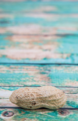 Peanut or ground nut over wooden background