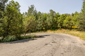 Hairpn Turn with Warning Arrows on each side of turn