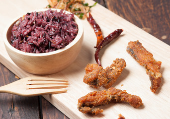 Fried fish and Brown rice in Thailand food