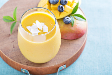 Mango smoothie on a board