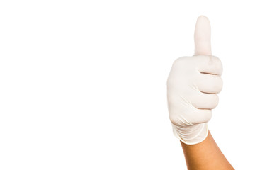 Hand in surgical latex glove gesture Thumbs up good