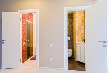 Modern apartment interior, corridor overlooking bathroom and toilet