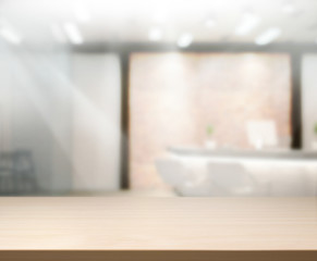 Obraz na płótnie Canvas Table Top And Blur Office Background