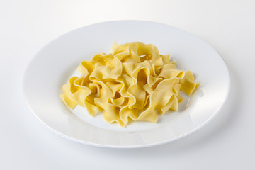 Tagliatelle Pasta on a White Plate