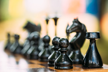 Black Old Chess Figures Standing On Chessboard © Great Brut Here