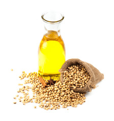 Soy beans and oil on white background