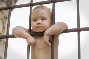 girl child behind bars