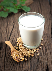 Soy milk with beans on wood