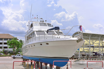 Yacht maintenance and repair outdoor on shore.